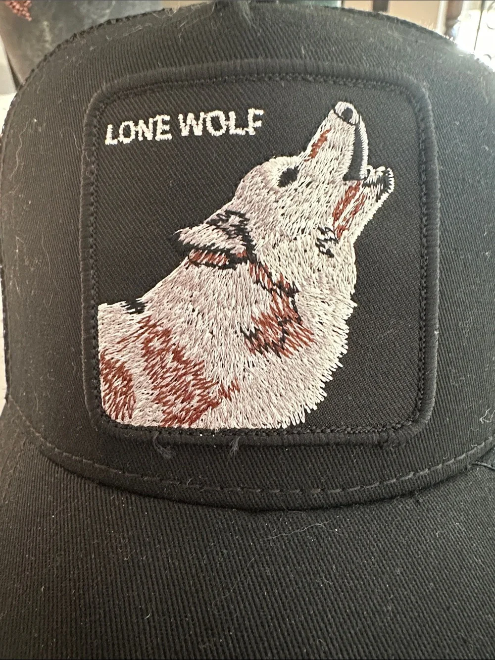 Goorin Bros Black Kids Trucker Hat with White and Brown Wolf Patch